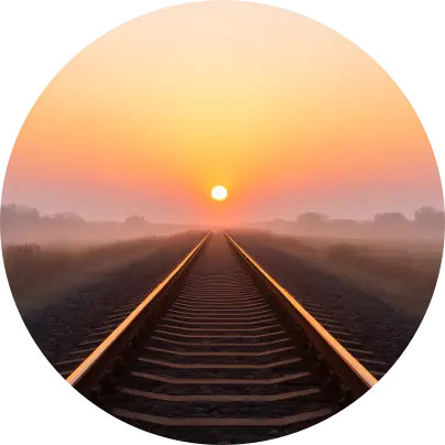 Railway tracks leading into a sunrise — getting back on track after a healing session in Chiang Mai